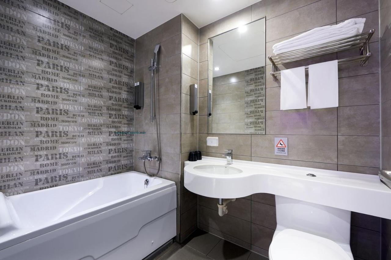 Kiwi Share Hotel Zhongli Bagian luar foto