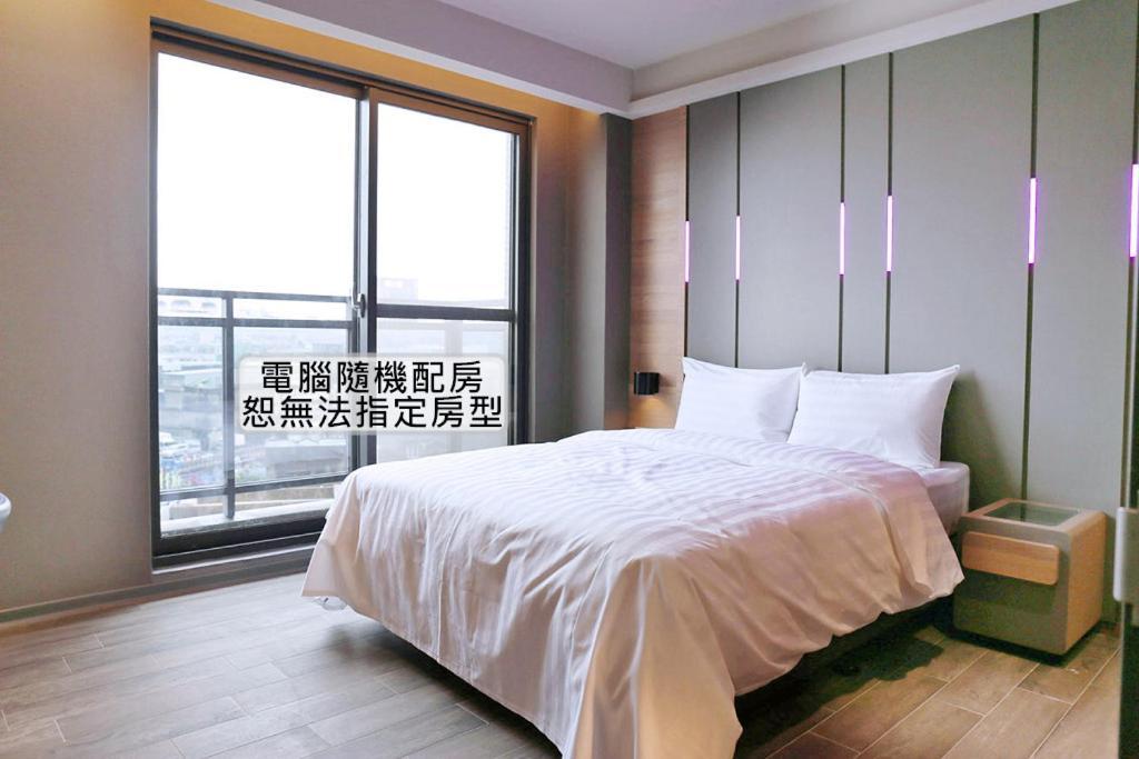 Kiwi Share Hotel Zhongli Bagian luar foto