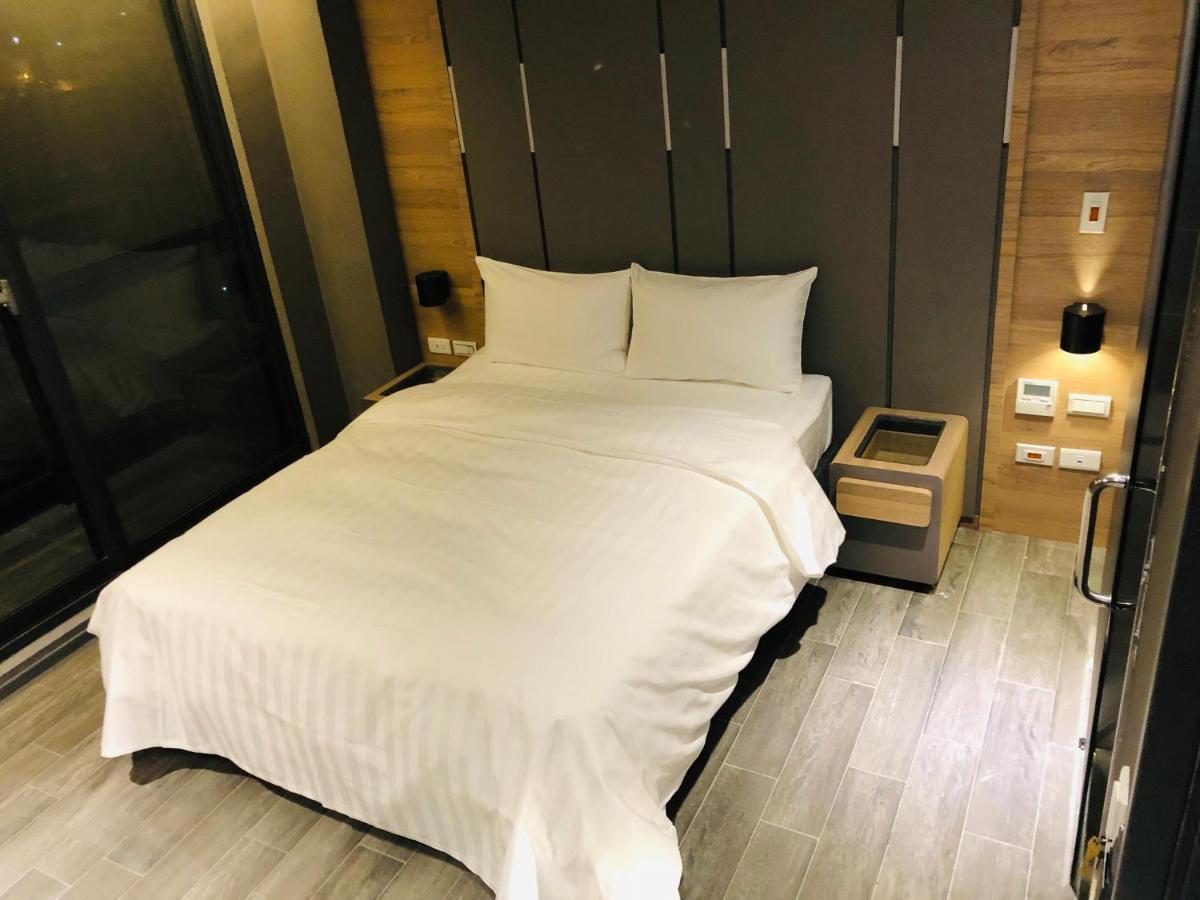 Kiwi Share Hotel Zhongli Bagian luar foto