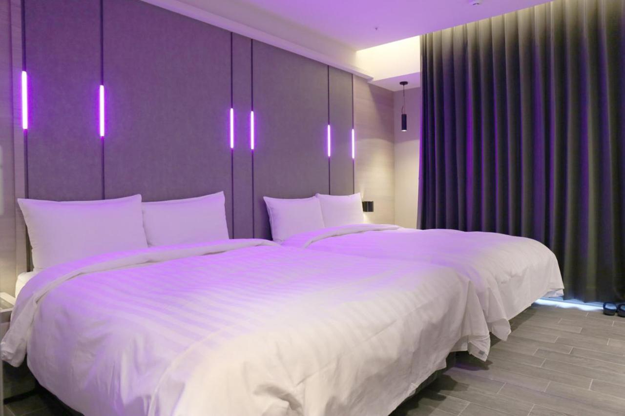 Kiwi Share Hotel Zhongli Bagian luar foto
