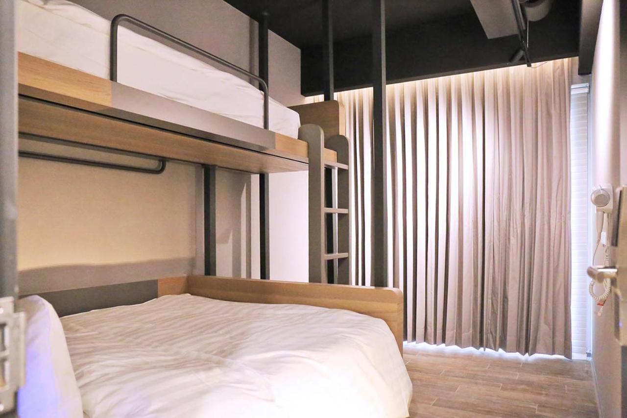 Kiwi Share Hotel Zhongli Bagian luar foto