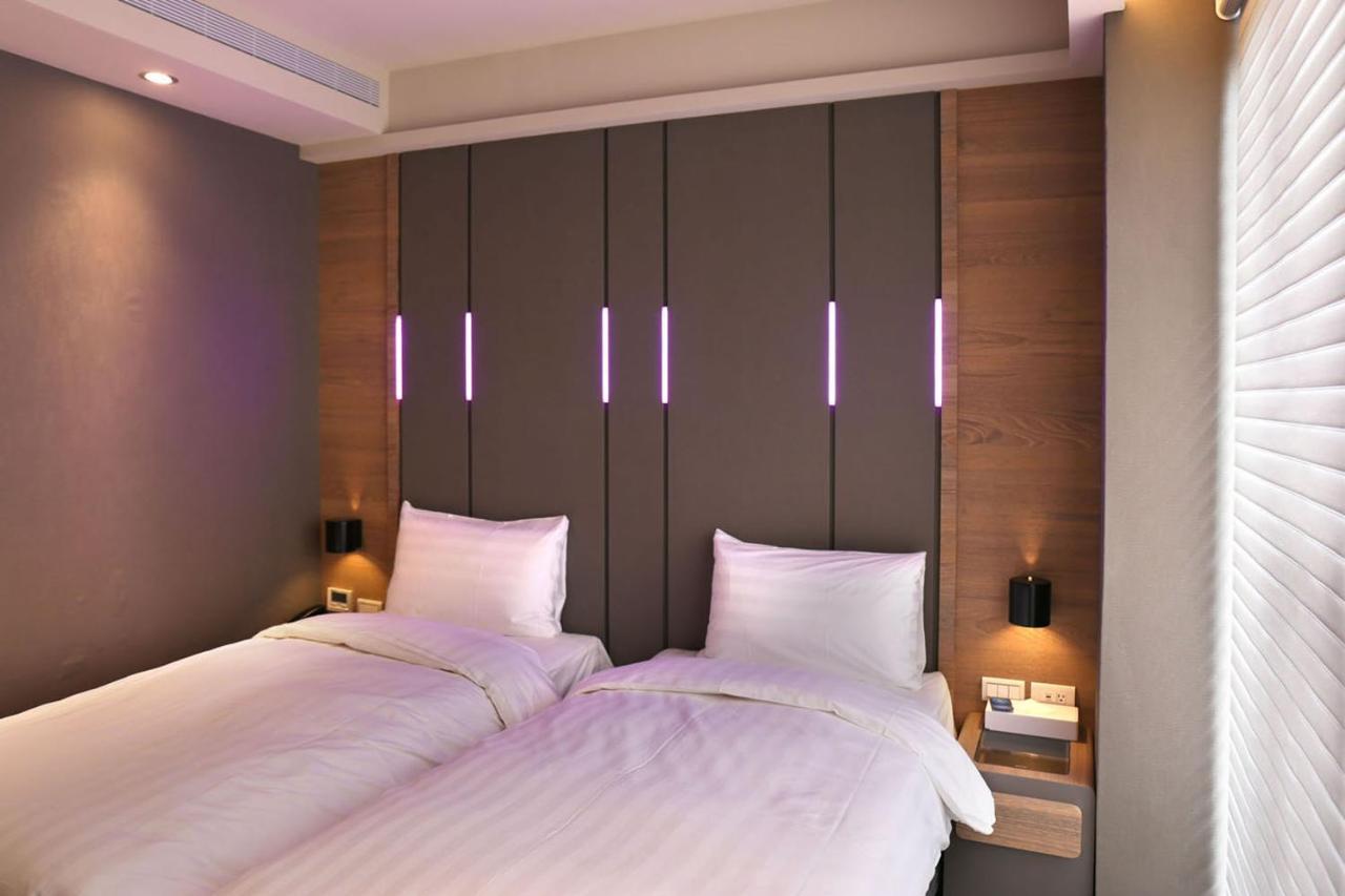 Kiwi Share Hotel Zhongli Bagian luar foto