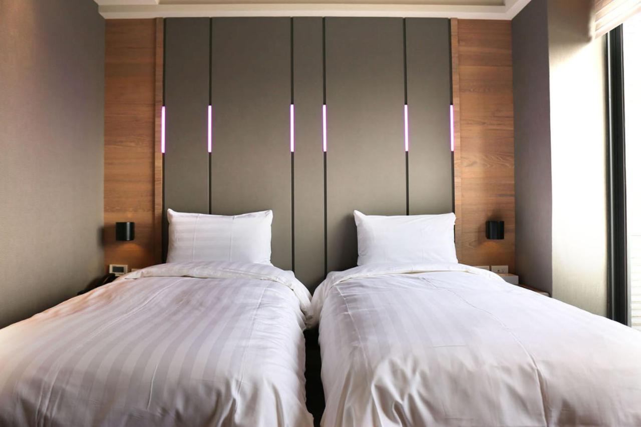 Kiwi Share Hotel Zhongli Bagian luar foto