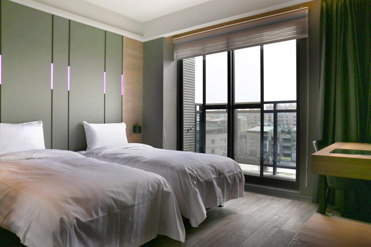 Kiwi Share Hotel Zhongli Bagian luar foto