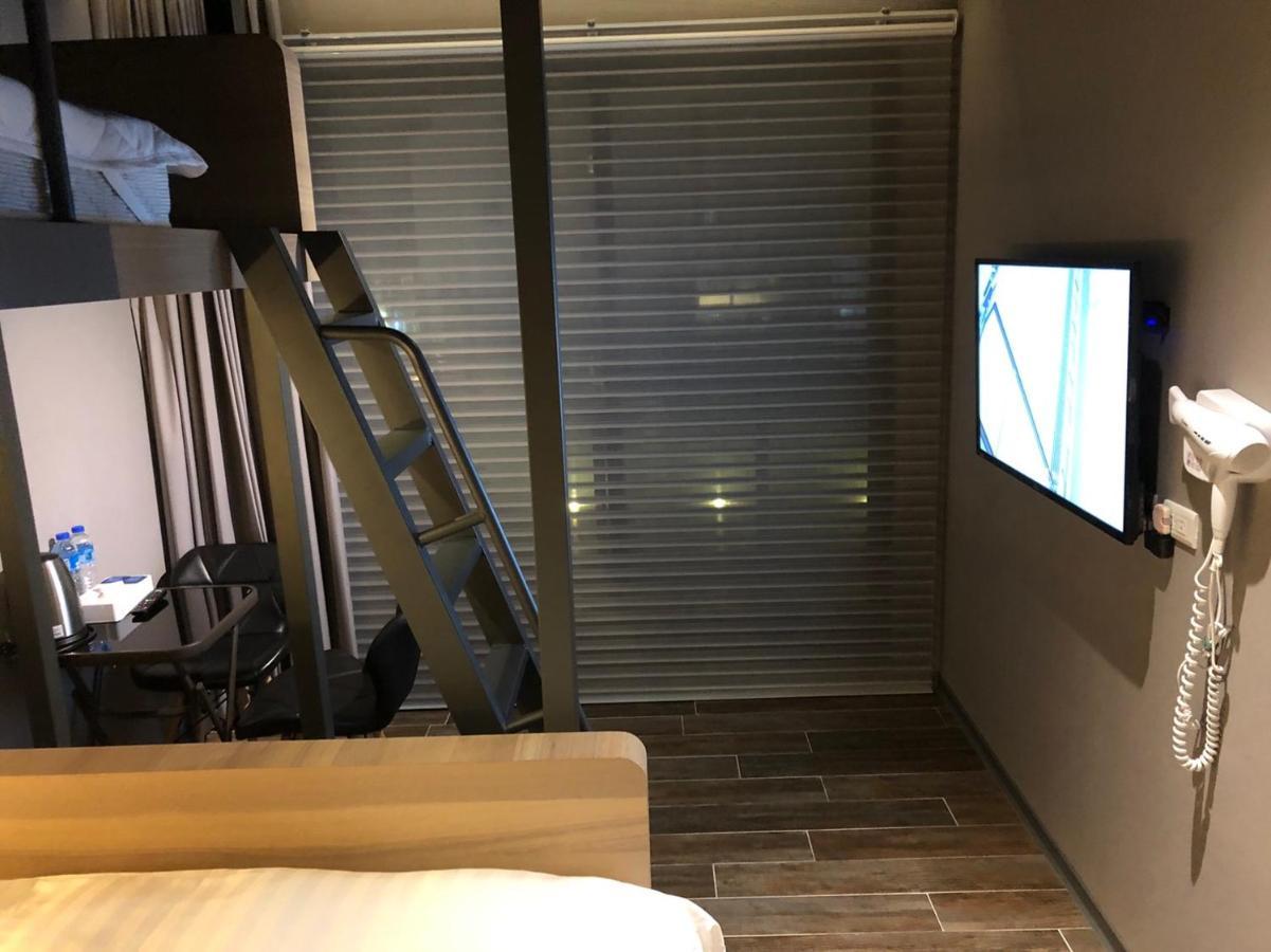 Kiwi Share Hotel Zhongli Bagian luar foto